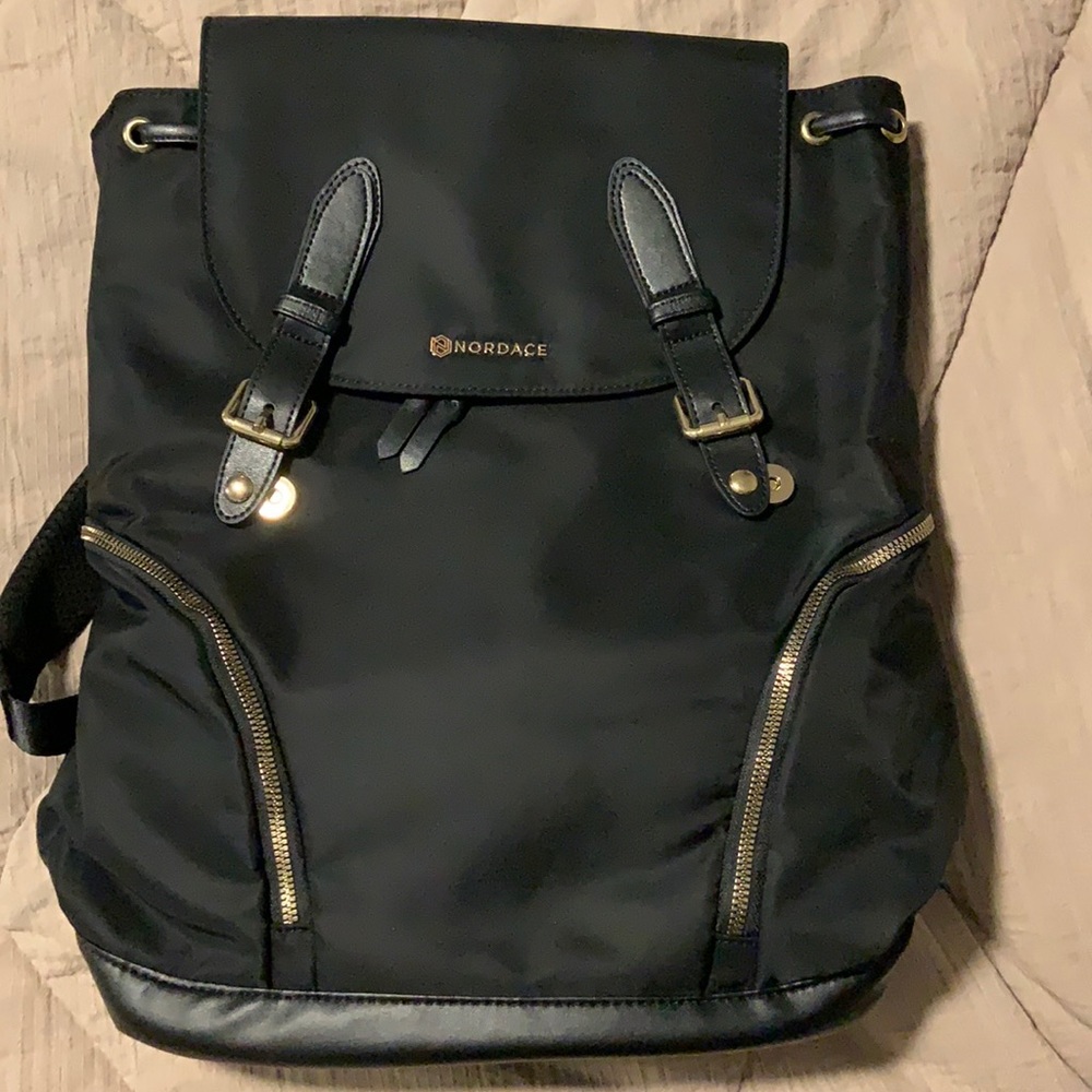 Brand New With Tag, never worn Black Nordace Eliz backpack, gold hardware